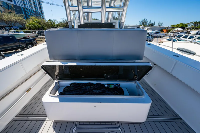 Slide: The Image of 2015 SeaHunter 37 Tournament boat with open storage compartment on deck. - 12