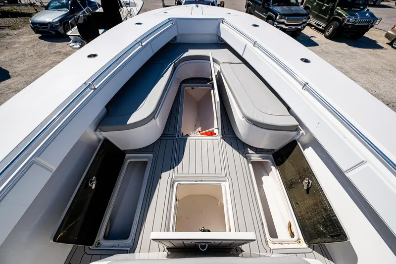 Slide: The Image of 2015 SeaHunter 37 Tournament boat interior with open storage compartments. - 16