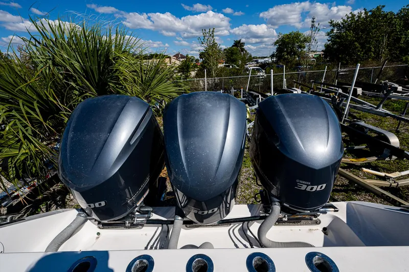 Slide: The Image of Three powerful outboard engines on a 2015 SeaHunter 37 Tournament boat. - 20