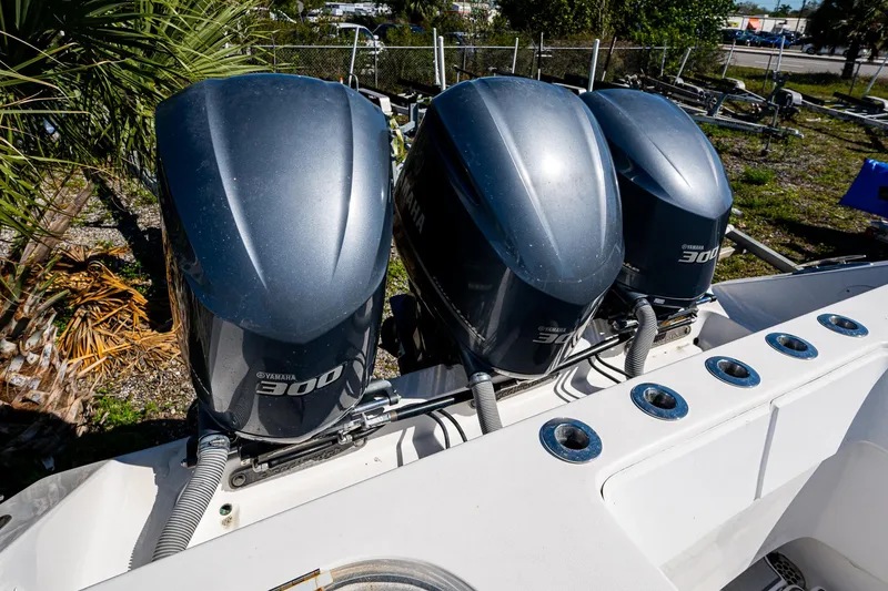 Slide: The Image of Triple outboard engines on a 2015 SeaHunter 37 Tournament boat. - 21