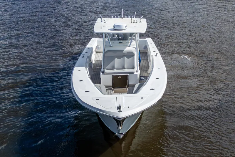 Slide: The Image of 2015 SeaHunter 37 Tournament boat on water, aerial view. - 24