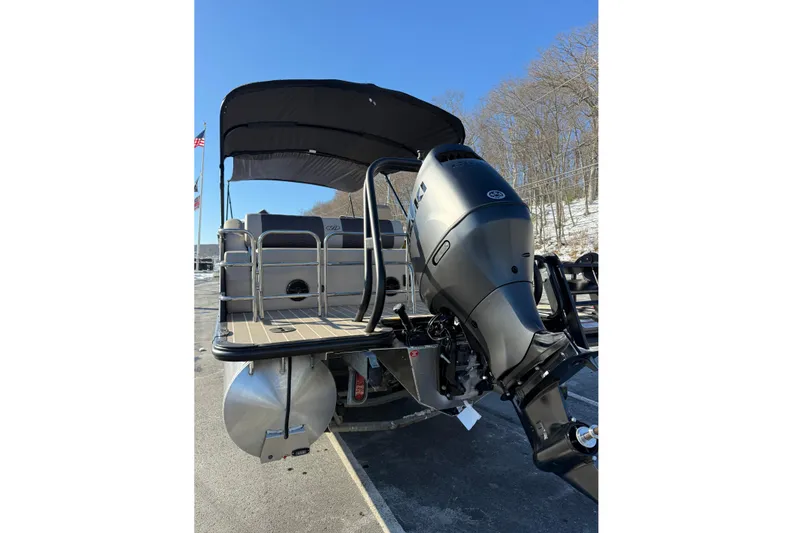 Slide: The Image of 2026 Bentley Pontoons Elite 223 Swingback Bench on display, featuring sleek design and powerful engine. - 2