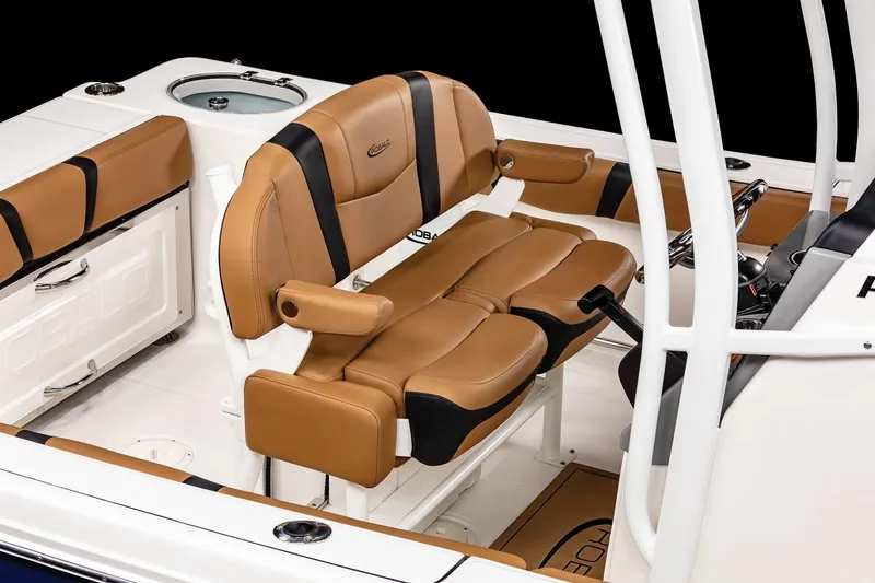 Slide: The Image of Manufacturer Provided Image: 2025 Robalo R230 Center Console boat with tan and black seating. - 6