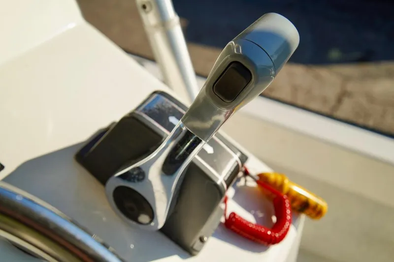 Slide: The Image of Close-up of throttle control on 1970 Aquasport 222 Flatback boat. - 18