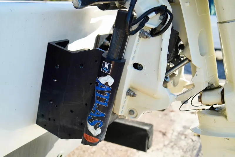 Slide: The Image of Close-up of 1970 Aquasport 222 Flatback boat motor mount with Atlas hydraulic jack plate. - 26