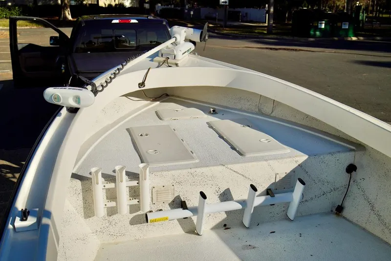 Slide: The Image of 1970 Aquasport 222 Flatback boat interior with rod holders and storage compartments. - 6