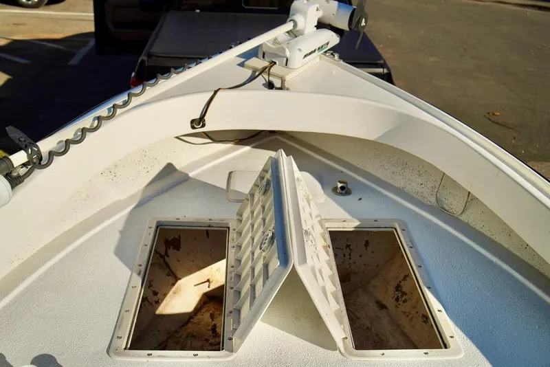 Slide: The Image of 1970 Aquasport 222 Flatback boat deck with open storage compartments. - 8