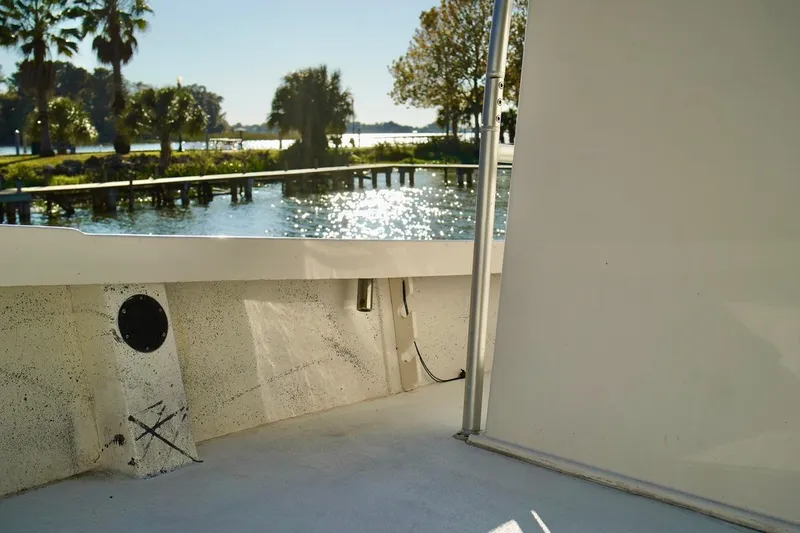 Slide: The Image of 1970 Aquasport 222 Flatback boat interior with scenic waterfront view. - 9