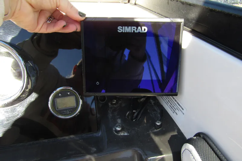 Slide: The Image of Simrad display on 2018 Sea Ray SPX 190 Outboard dashboard, close-up view. - 14