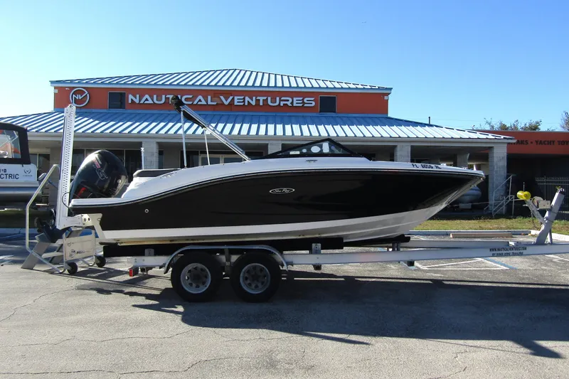 Slide: The Image of 2018 Sea Ray SPX 190 Outboard boat on trailer at Nautical Ventures dealership. - 3