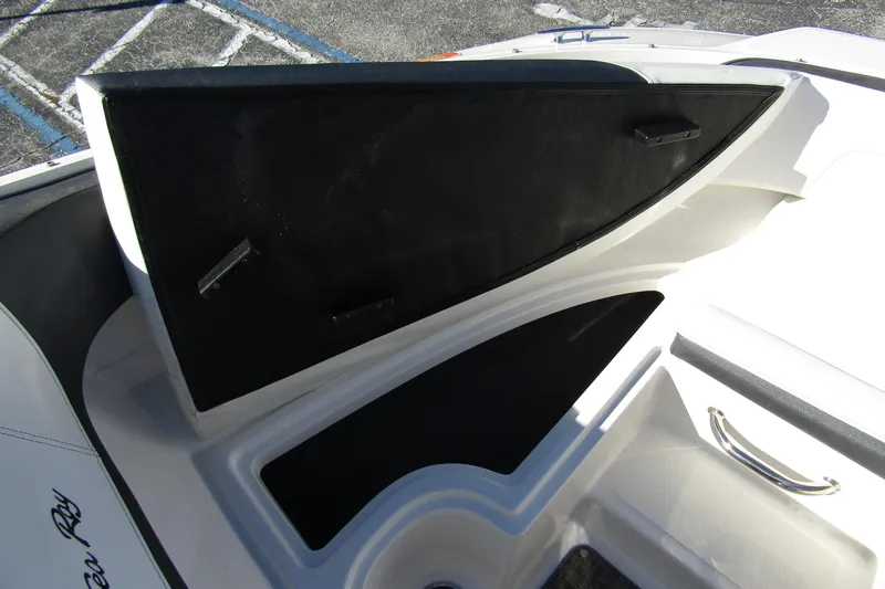 Slide: The Image of 2018 Sea Ray SPX 190 Outboard boat interior storage compartment. - 7