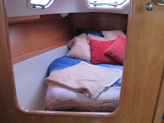 Slide: The Image of Cozy cabin in a 2000 Catalina 310 yacht. - 12
