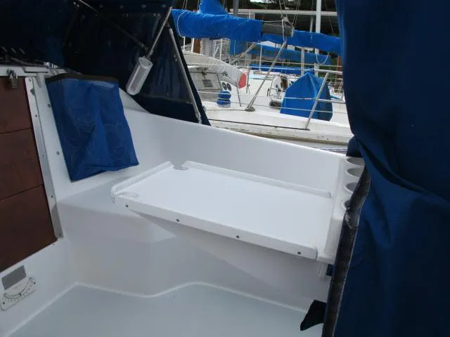 Slide: The Image of Interior of a 2000 Catalina 310 yacht with blue covers. - 20