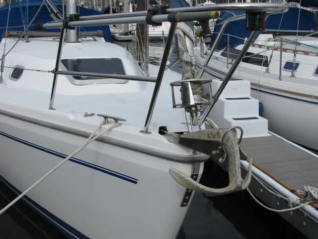 Slide: The Image of 2000 Catalina 310 sailboat docked in harbor. - 31