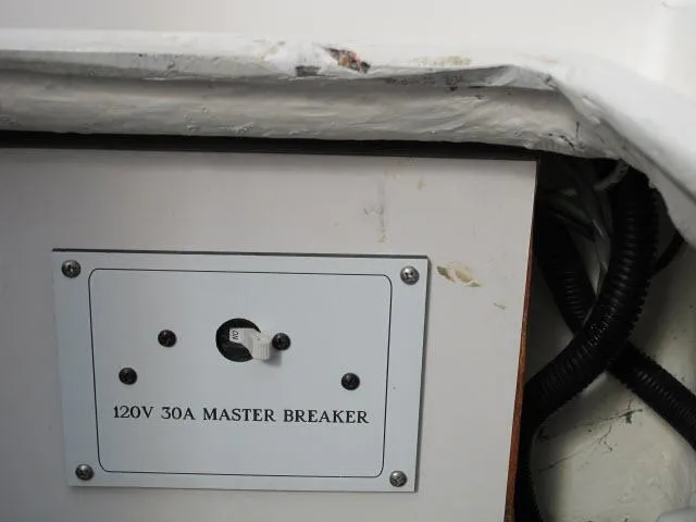 Slide: The Image of 120V 30A master breaker on Catalina 310, year 2000. - 32