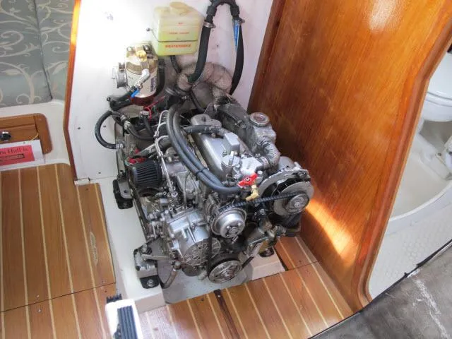 Slide: The Image of Engine compartment of a 2000 Catalina 310 yacht. - 33