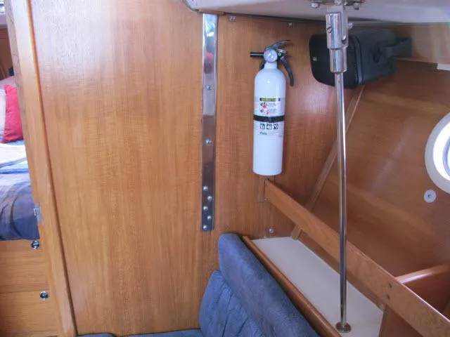 Slide: The Image of Interior of a 2000 Catalina 310 yacht with fire extinguisher. - 5