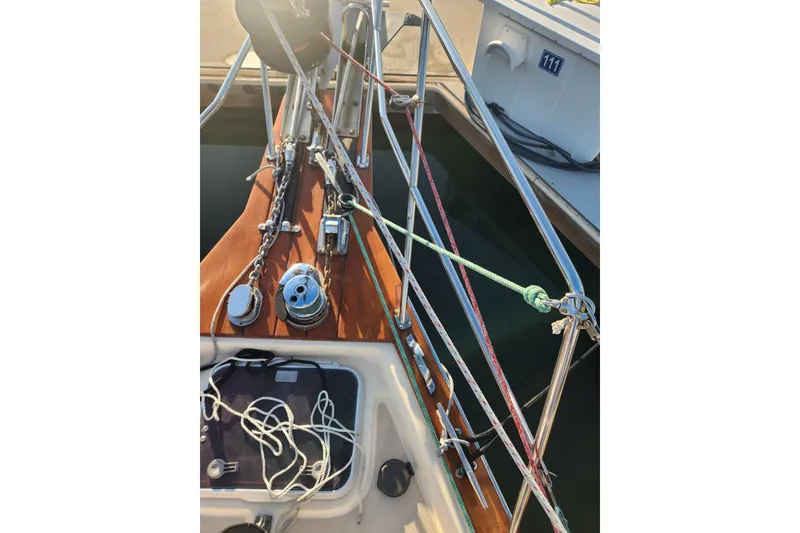 Slide: The Image of Deck view of a 2006 Island Packet 370 sailboat with ropes and winch. - 14