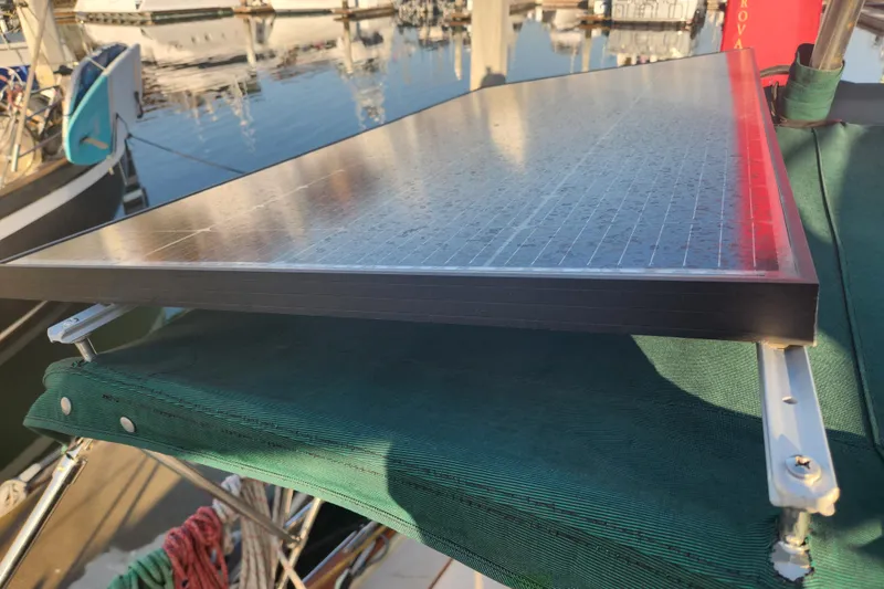 Slide: The Image of Solar panel on 2006 Island Packet 370 sailboat, docked at marina. - 22