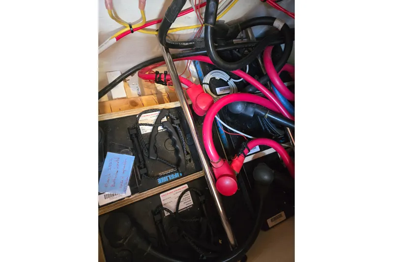 Slide: The Image of Electrical wiring and components inside a 2006 Island Packet 370 sailboat. - 51