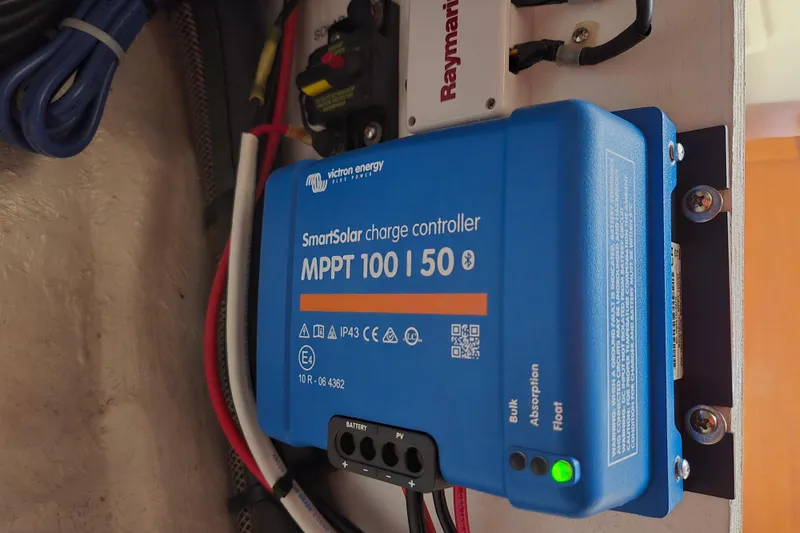 Slide: The Image of Victron Energy SmartSolar charge controller in 2006 Island Packet 370 sailboat. - 52