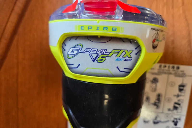 Slide: The Image of EPIRB GlobalFix V5 device on Island Packet 370, 2006 model. - 57