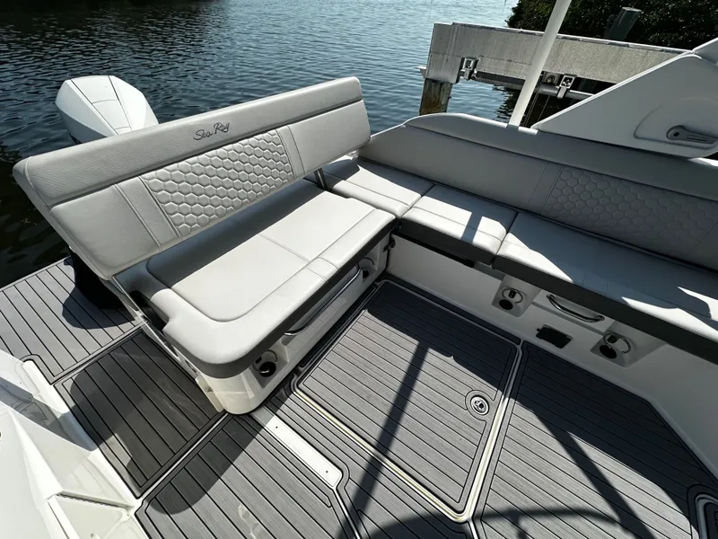 Slide: The Image of Interior of 2023 Sea Ray SDX 250 Outboard with gray seating. - 11
