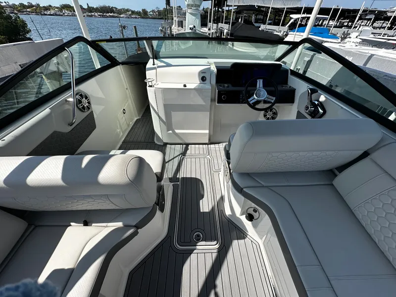 Slide: The Image of Interior of 2023 Sea Ray SDX 250 Outboard with sleek seating. - 15