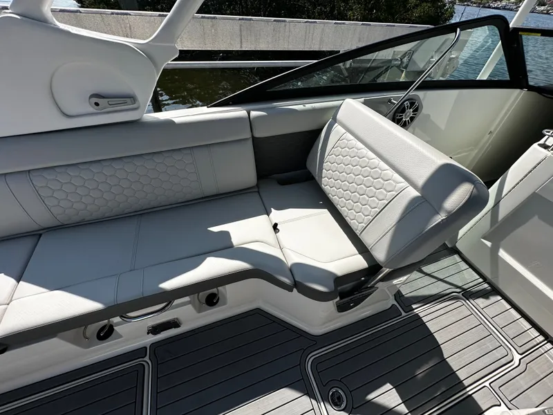 Slide: The Image of Interior of 2023 Sea Ray SDX 250 Outboard with luxurious seating. - 18