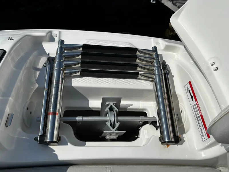 Slide: The Image of Folded swim ladder on 2023 Sea Ray SDX 250 Outboard. - 26