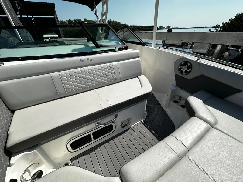 Slide: The Image of Interior of 2023 Sea Ray SDX 250 Outboard with gray upholstery. - 28