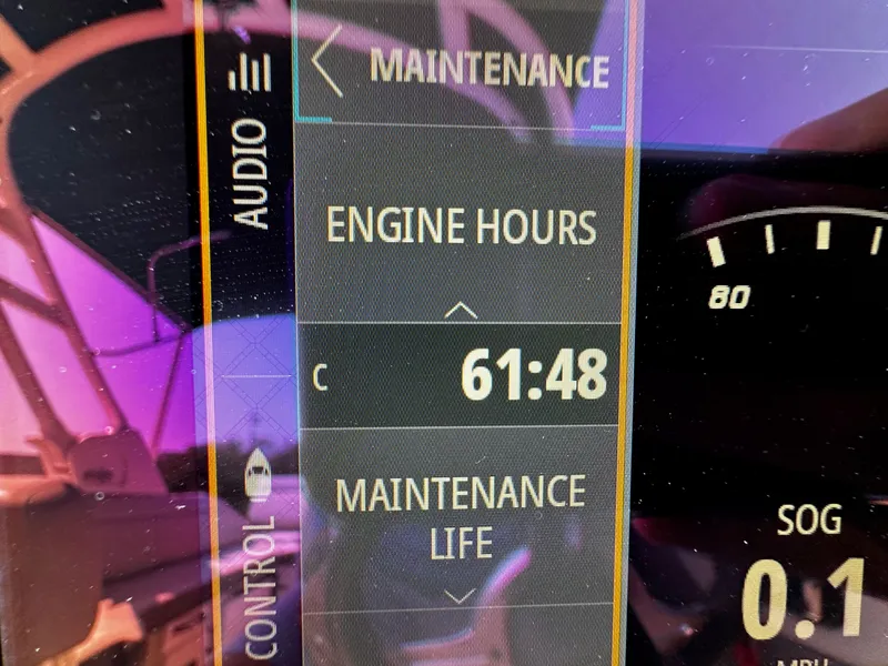 Slide: The Image of Sea Ray SDX 250 Outboard 2023 maintenance display showing 61:48 engine hours. - 33
