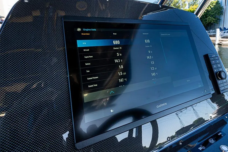 Slide: The Image of Dashboard of 2025 SACS Strider 11 displaying engine data on Garmin screen. - 16
