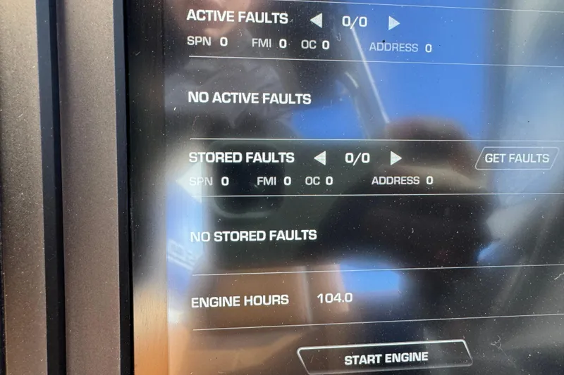 Slide: The Image of 2024 Supra SL 575 dashboard showing no active or stored faults, 104 engine hours. - 11