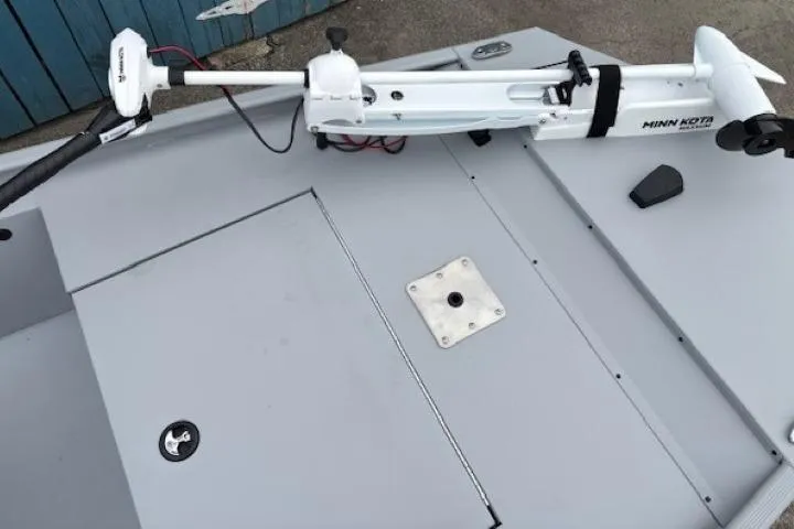 Slide: The Image of 2026 Tracker Bass Tracker Classic CC boat with Minn Kota trolling motor on deck. - 5