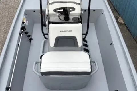 Slide: The Image of 2026 Tracker Bass Tracker Classic CC boat interior with seating and steering console. - 8