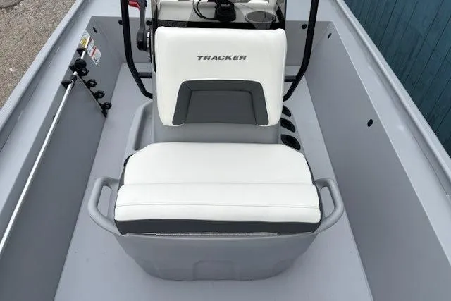 Slide: The Image of 2026 Tracker Bass Tracker Classic CC boat interior with white seating and console. - 9