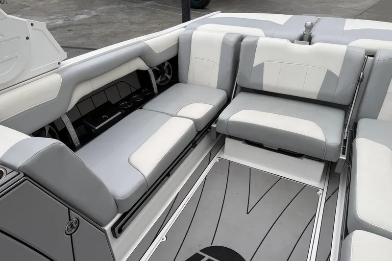 Slide: The Image of 2020 Malibu Wakesetter 25 LSV interior with gray and white seating. - 15