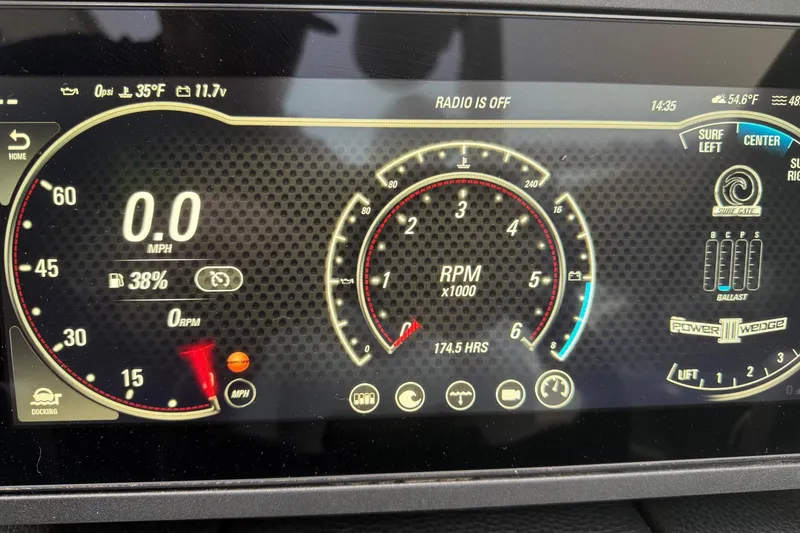Slide: The Image of 2020 Malibu Wakesetter 25 LSV dashboard display showing speed, RPM, and ballast settings. - 18