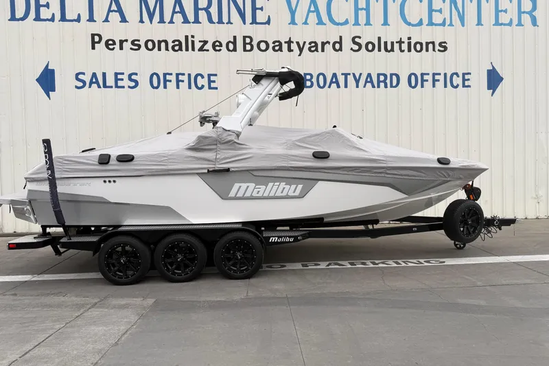 Slide: The Image of 2020 Malibu Wakesetter 25 LSV boat covered, parked at Delta Marine Yacht Center. - 24