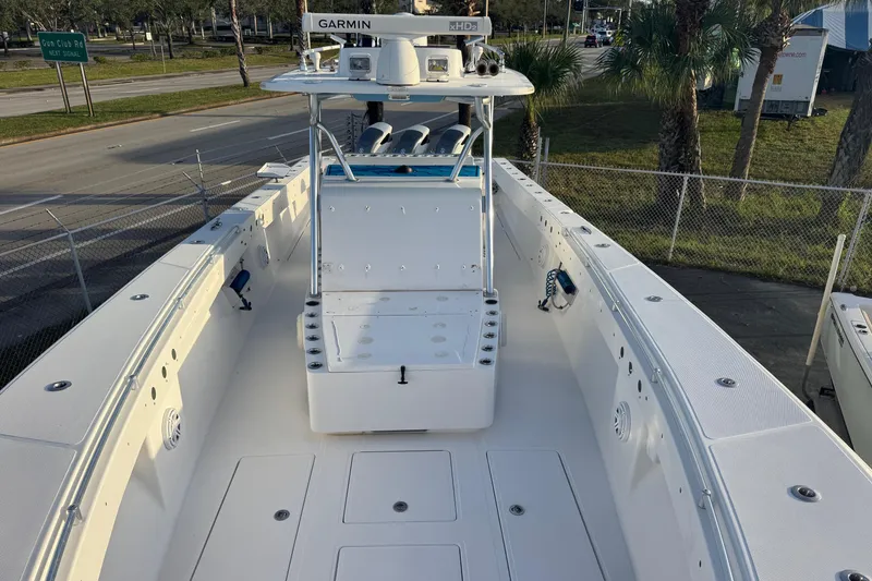 Slide: The Image of 2015 SeaHunter 41 Tournament boat with spacious deck and advanced Garmin navigation system. - 15