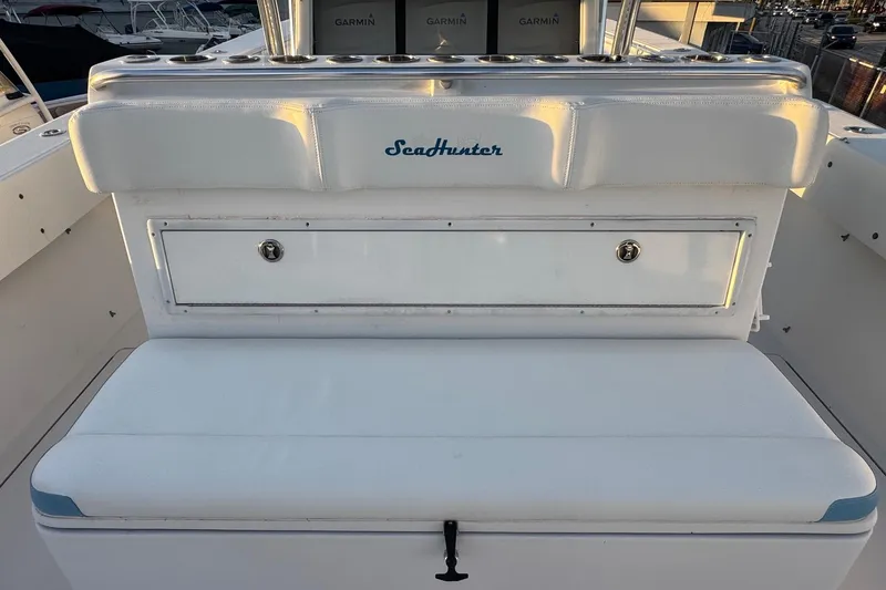 Slide: The Image of 2015 SeaHunter 41 Tournament boat interior with seating and storage compartments. - 50