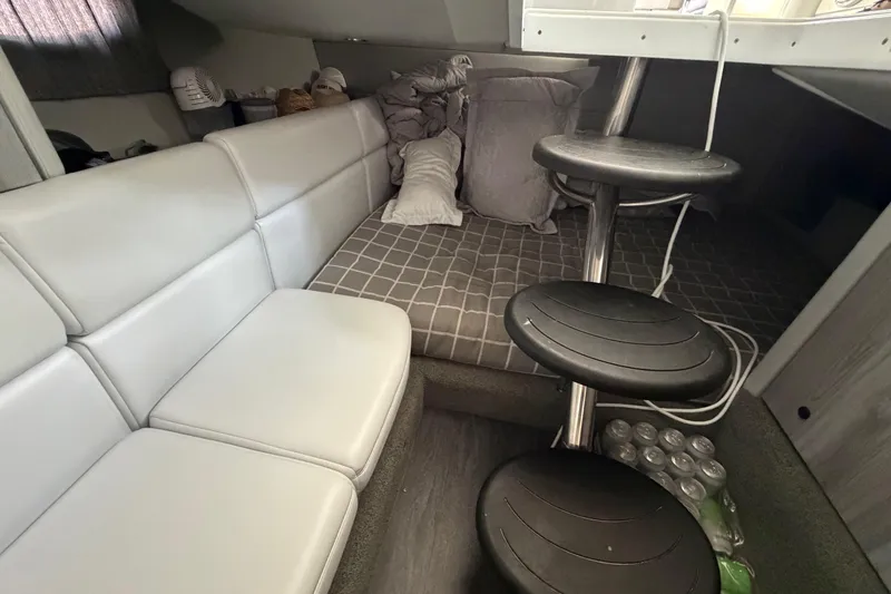 Slide: The Image of Interior cabin of 2021 Formula 350 Crossover Bowrider I/O with seating and bedding. - 13