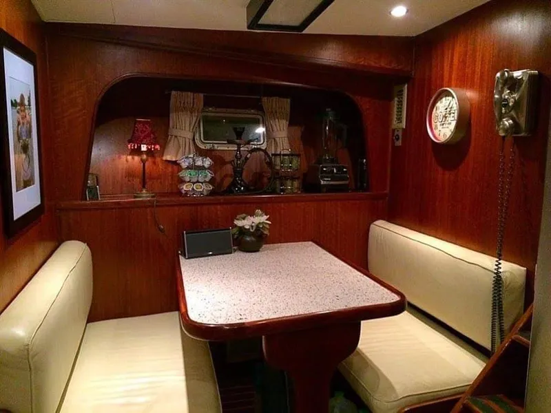 Slide: The Image of Interior of 1971 Hatteras 58 Motor Yacht, cozy dining nook. - 15