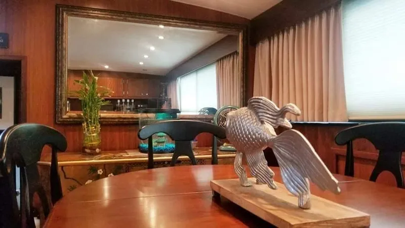 Slide: The Image of Interior of a 1971 Hatteras 58 Motor Yacht with elegant decor. - 18