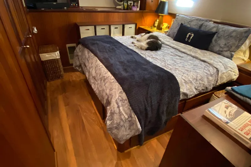 Slide: The Image of Interior of a 1971 Hatteras 58 Motor Yacht with cozy bedroom. - 5