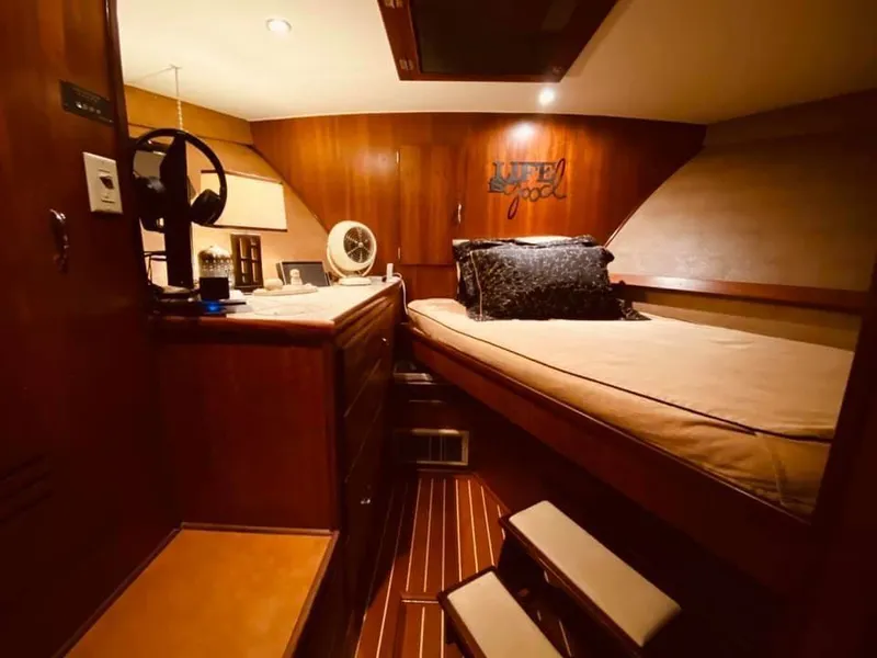 Slide: The Image of Interior of 1971 Hatteras 58 Motor Yacht, cozy cabin with wood finish. - 8