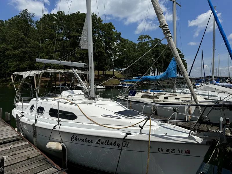 Slide: The Image of 2000 Hunter 290 sailboat docked at marina. - 1