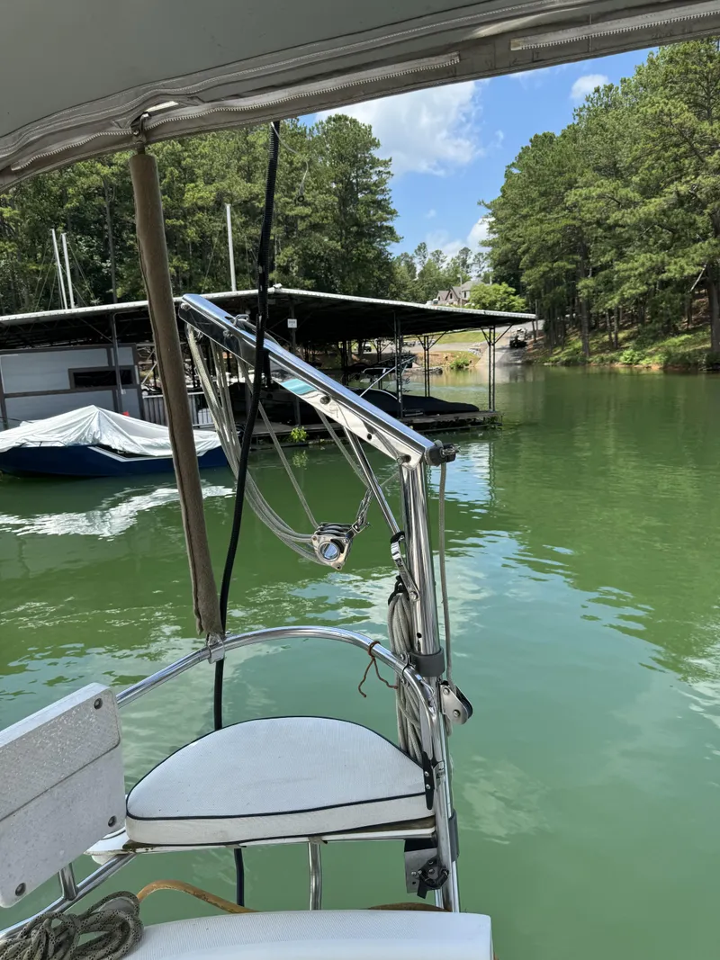 Slide: The Image of Hunter 290 sailboat from 2000 in a tranquil marina. - 13