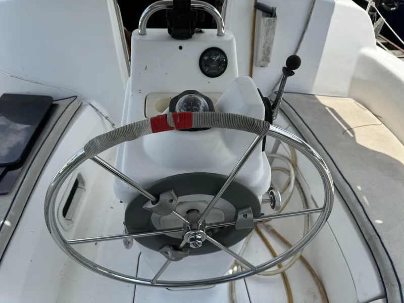 Slide: The Image of Steering wheel of a 2000 Hunter 290 yacht. - 18
